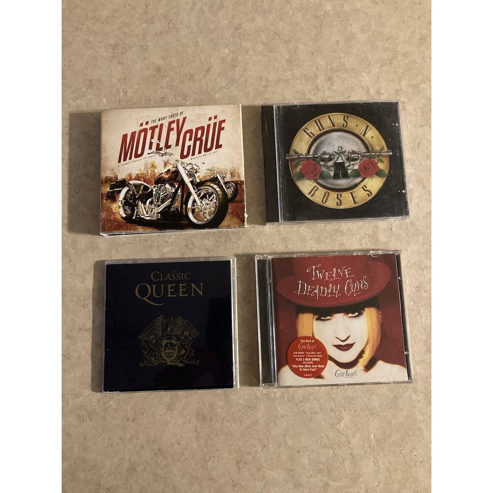4 Rock CD Lot Motley Crue, Classic Queen, Guns and Roses, and Cyndi Lauper Good!